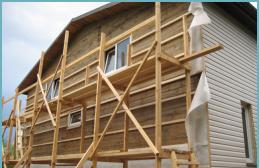 Finishing the siding of a wooden house - do-it-yourself insulation